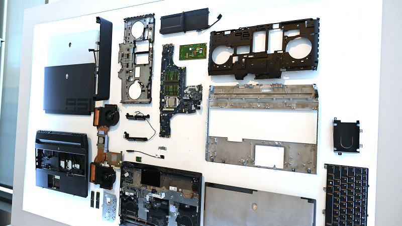 In the center is the motherboard with a Z390 chipset and a desktop CPU mounted right in.